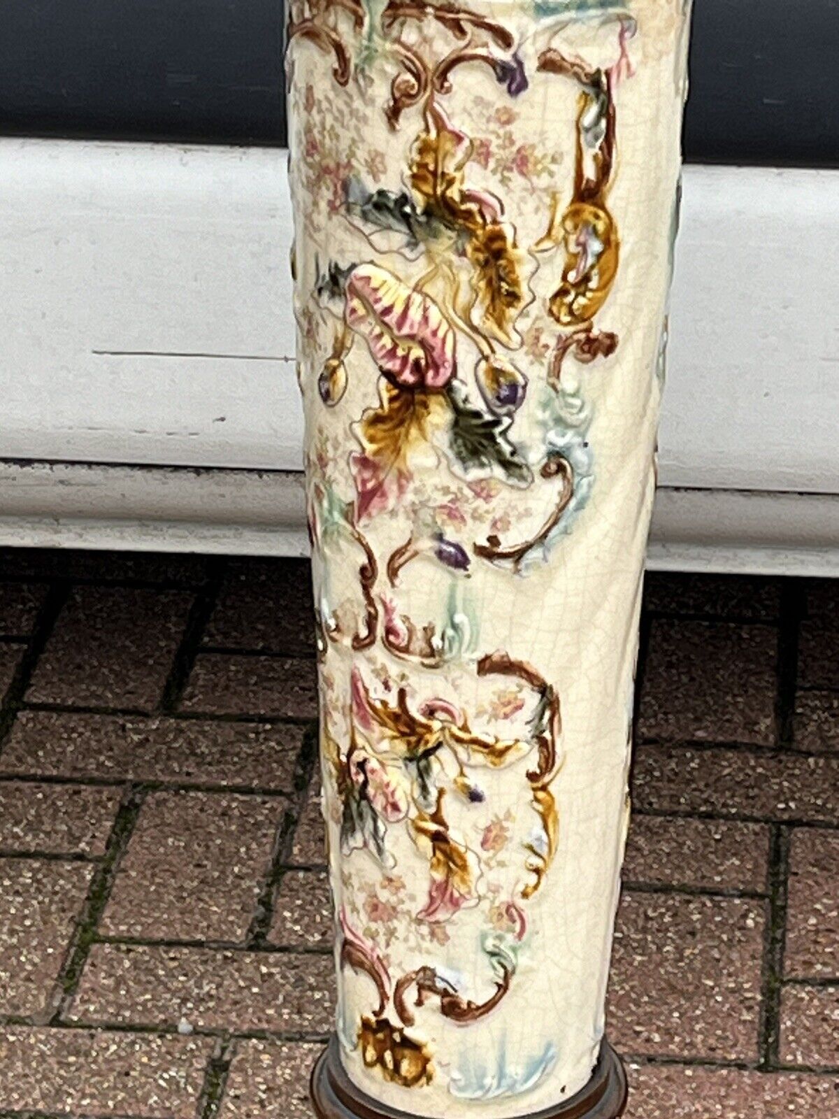 Art Nouveau stand in earthenware and ebonised wood.