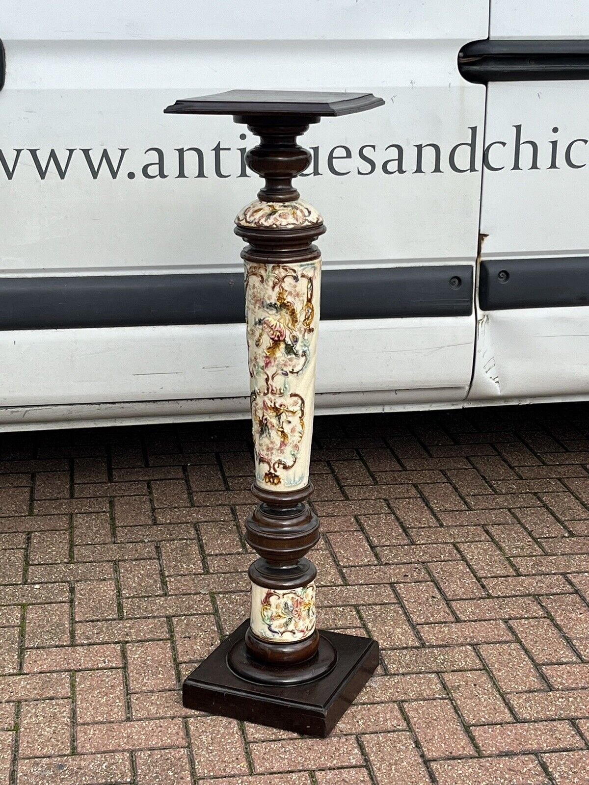 Art Nouveau stand in earthenware and ebonised wood.