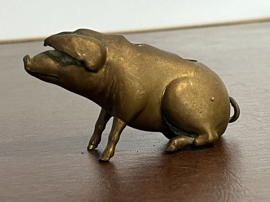 Novelty Candle Holder In Shape Of A Seated Pig, Bronze Or Brass.