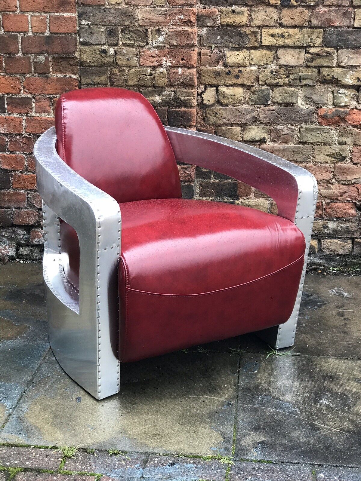 Aviators Armchair, Aluminium With Red Leather Upholstery.