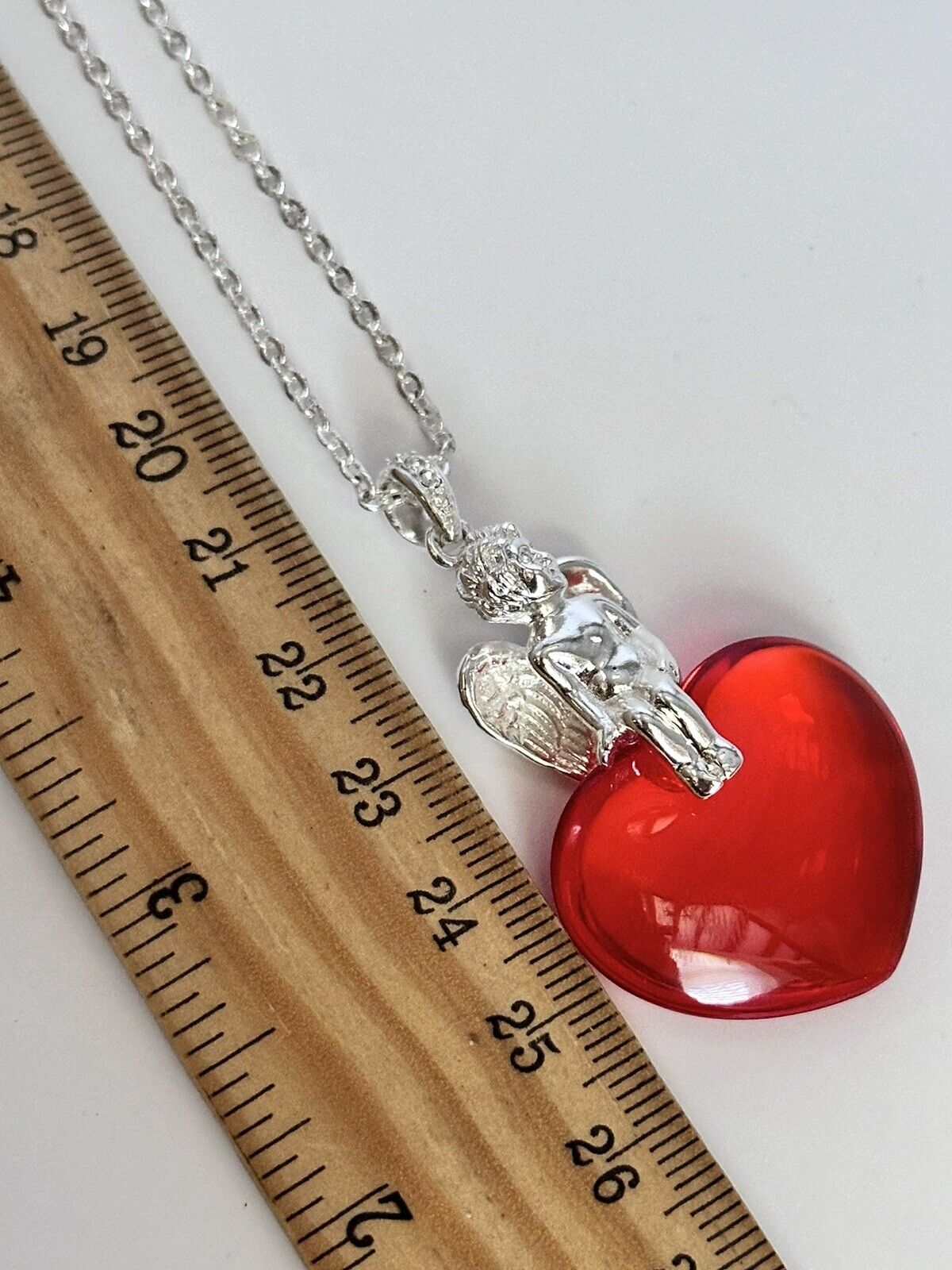 Vintage 1980s Rhodium Plated Cherub Glass Heart Necklace New Old Stock