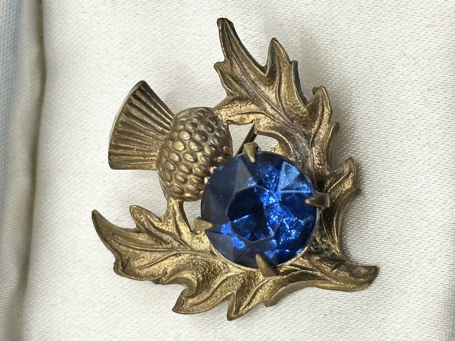 Vintage Gold Tone Thistle Brooch With Blue Glass Stone