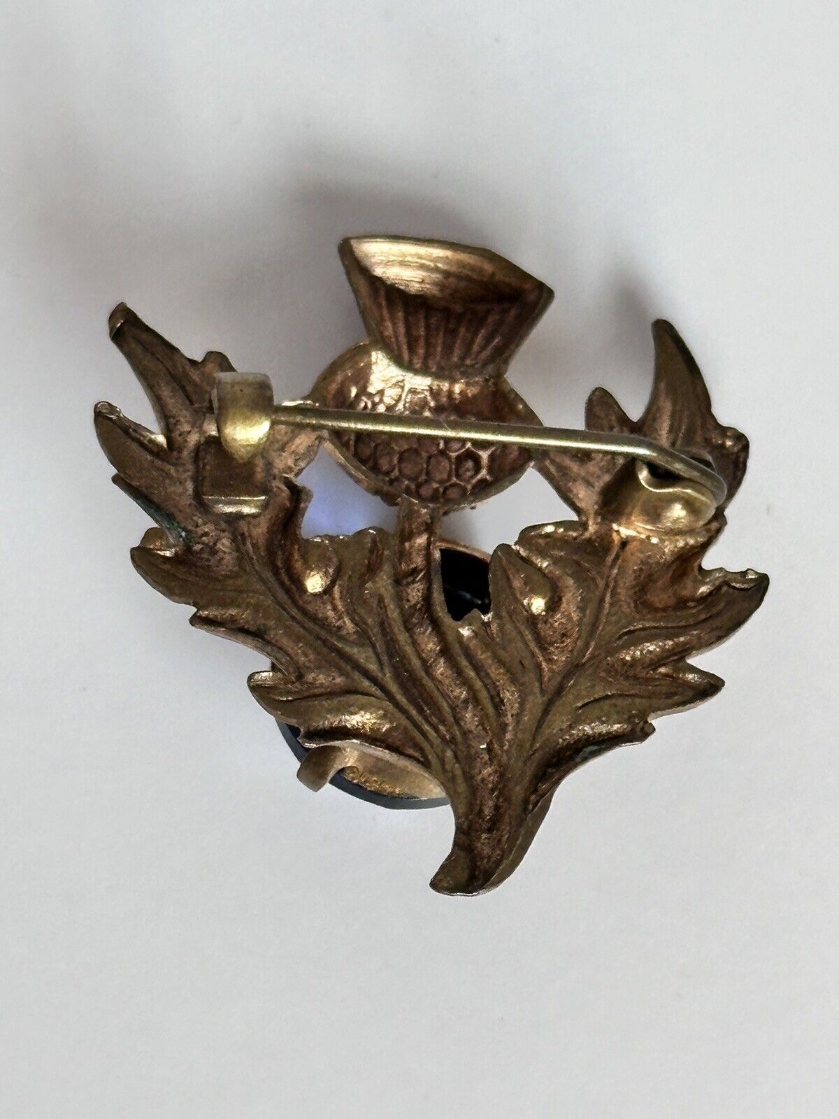 Vintage Gold Tone Thistle Brooch With Blue Glass Stone