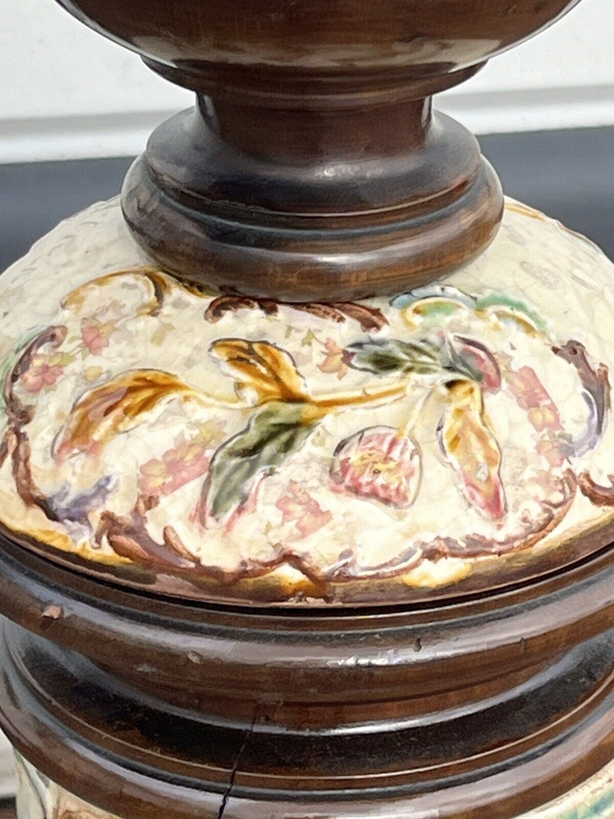 Art Nouveau stand in earthenware and ebonised wood.