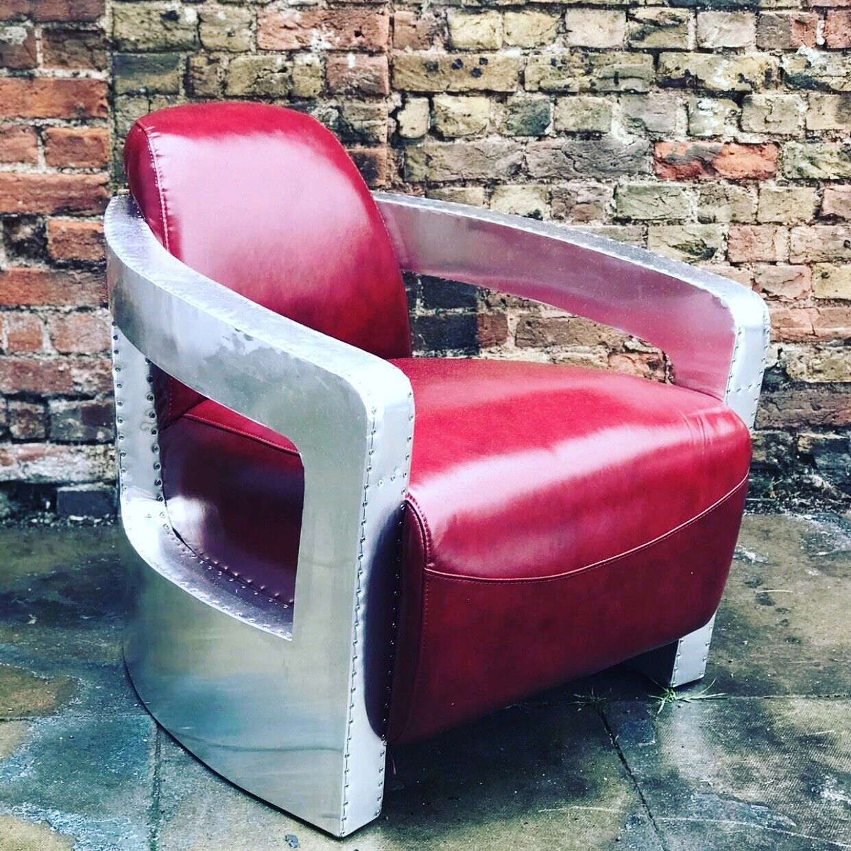 Aviators Armchair, Aluminium With Red Leather Upholstery.