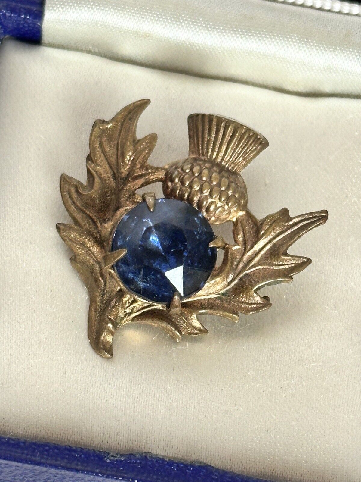 Vintage Gold Tone Thistle Brooch With Blue Glass Stone