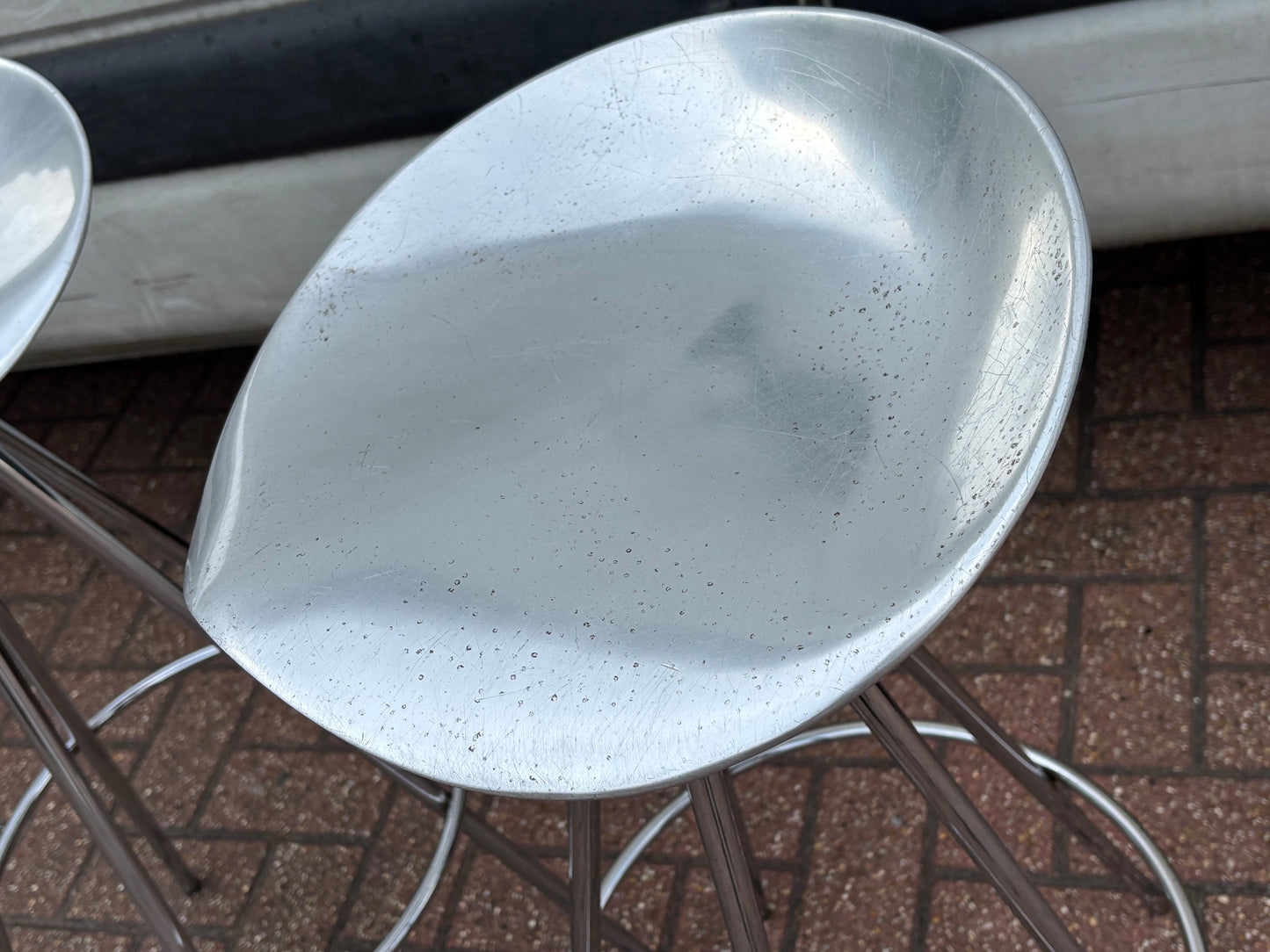 A pair of Aluminium & Chrome Jamaica Stools, design by Pepe Coates for Amat.