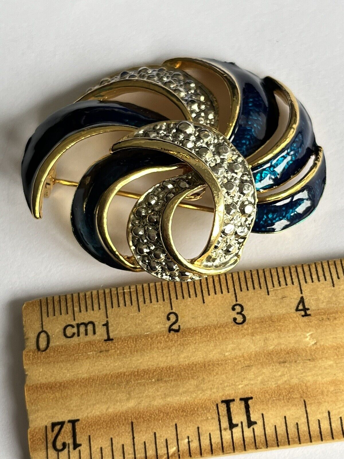 Vintage Gold Tone Blue Enamel Swirl Brooch