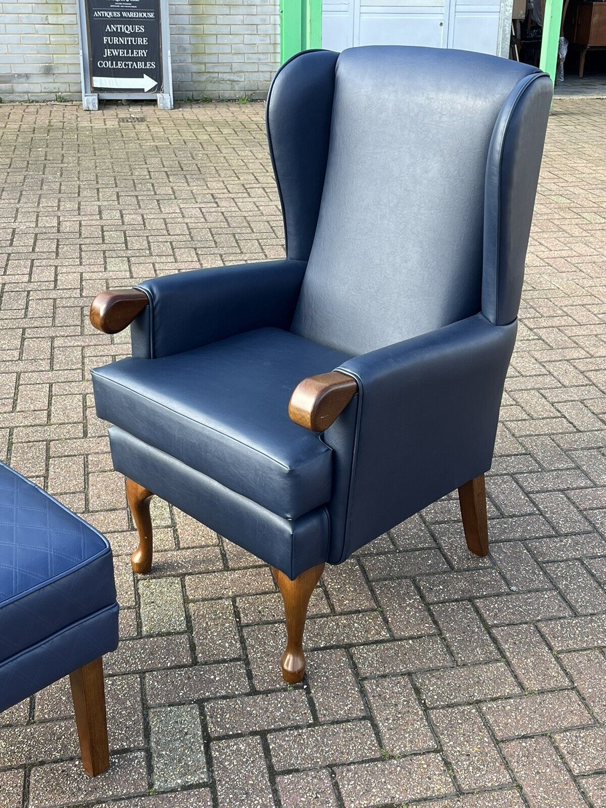 Blue Leather Armchair & Matching Foot Stool.
