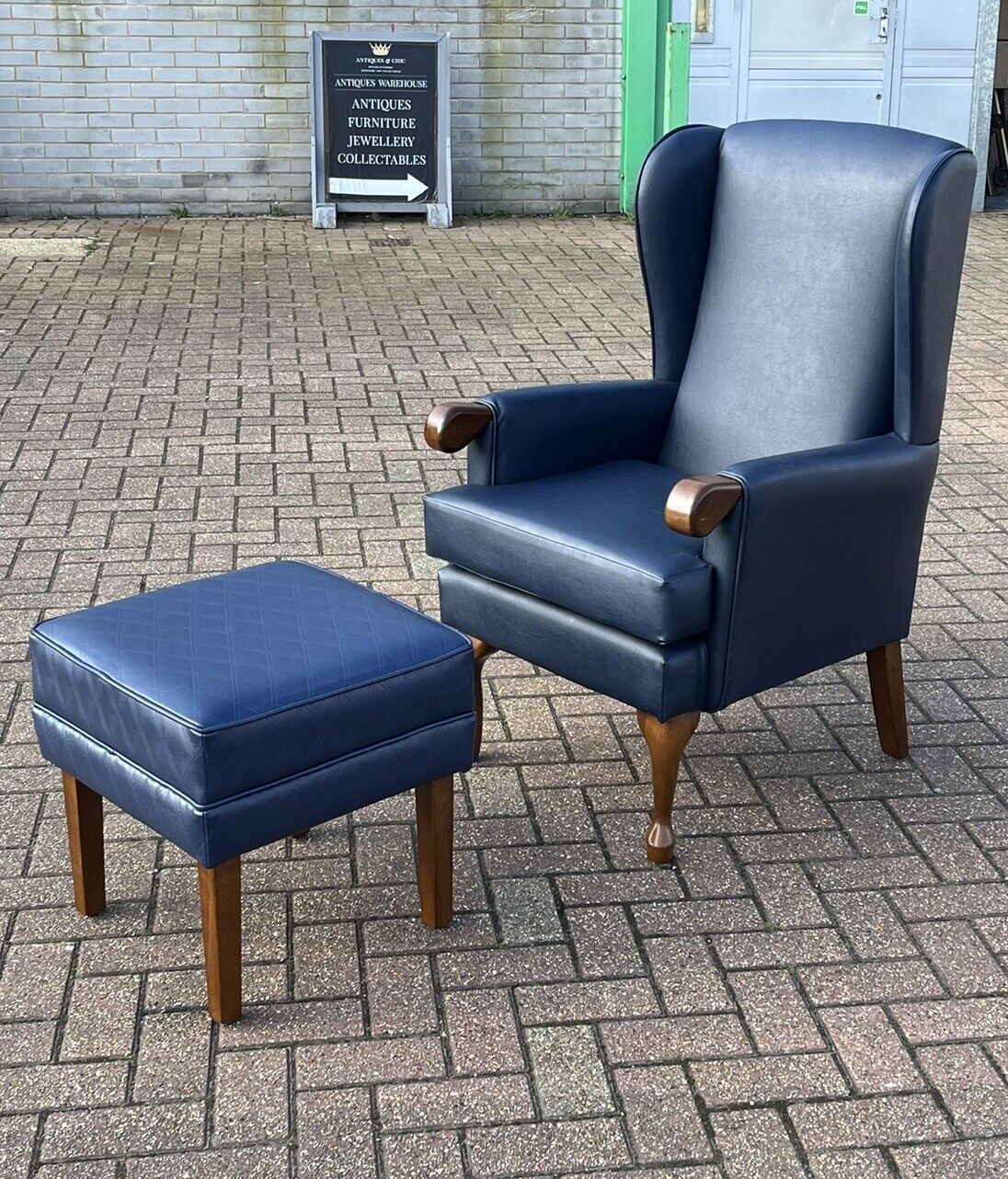 Blue Leather Armchair & Matching Foot Stool.
