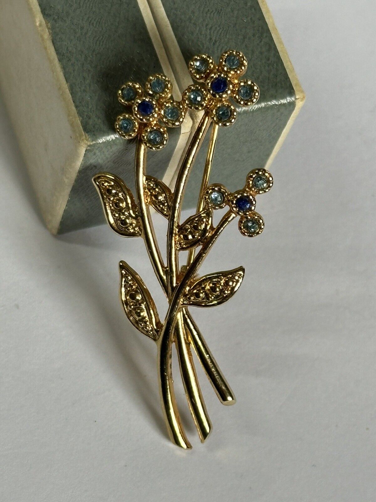 Vintage Gold Plated Movitex Flower Spray Blue Stone Brooch