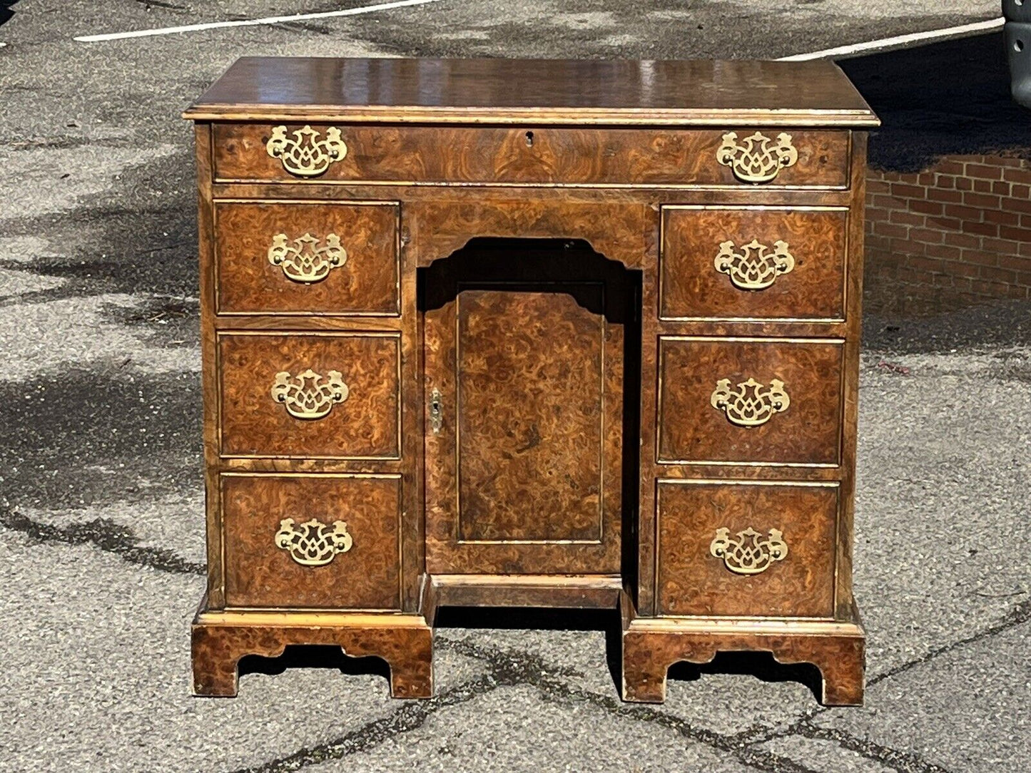 Burr Walnut Kneehole Desk. With Brass Handles And On Bracket Feet