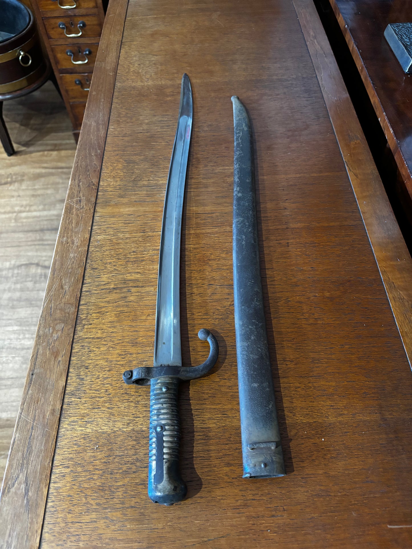 Victorian French Bayonet, dated 1873 matching numbers sheaf.
