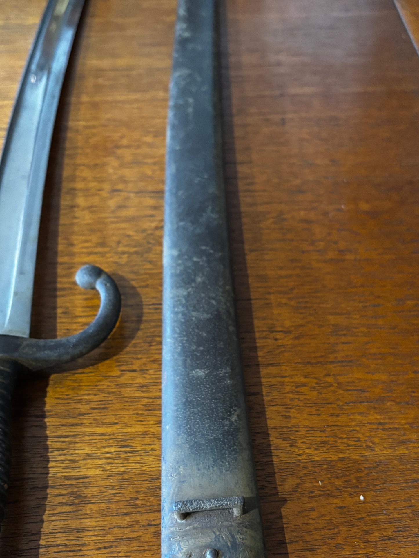 Victorian French Bayonet, dated 1873 matching numbers sheaf.