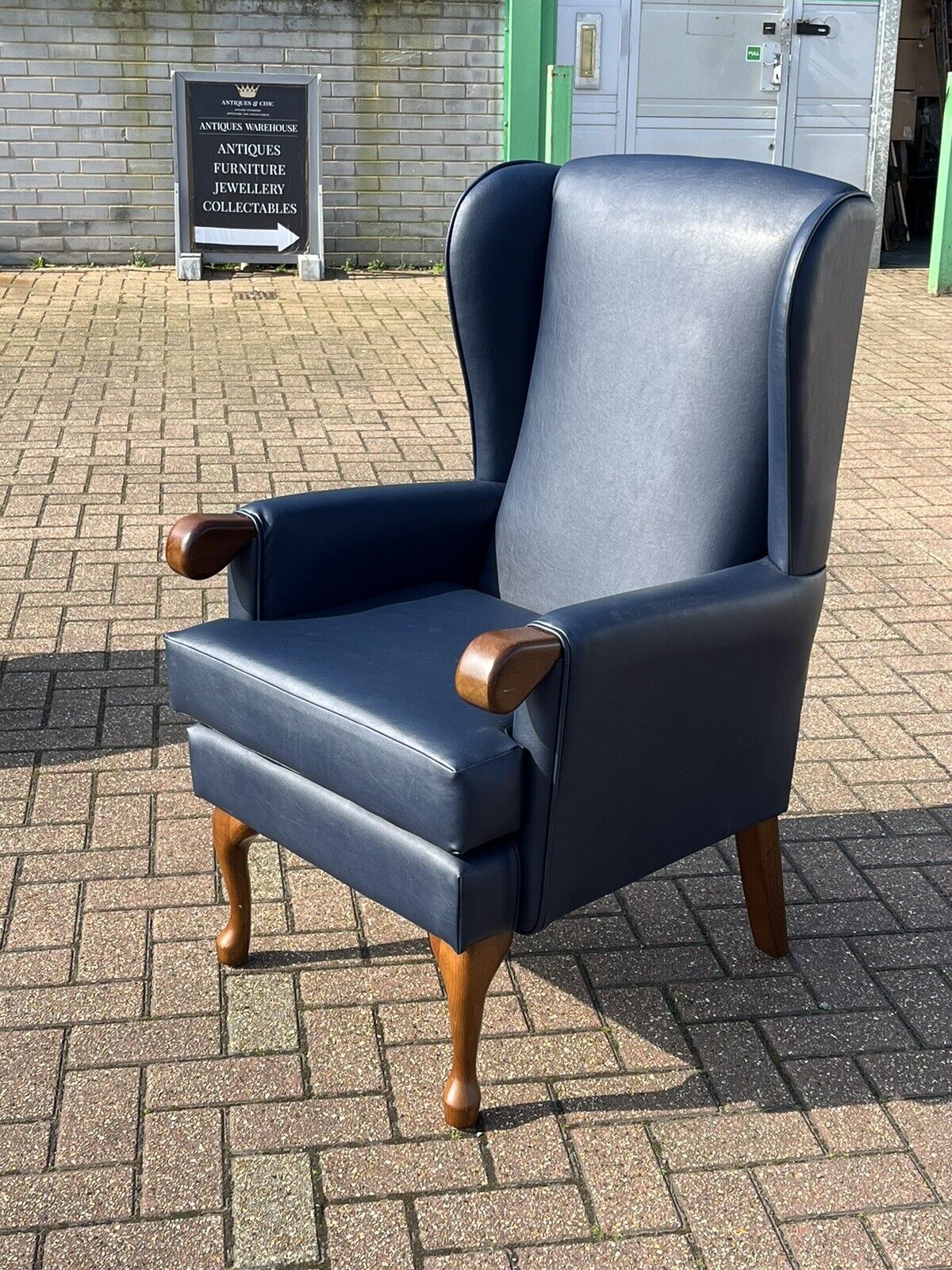 Blue Leather Armchair & Matching Foot Stool.