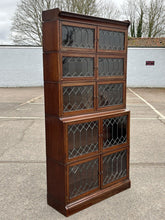 Edwardian Oak Sectional Bookcase With Lead light Glazing.
