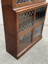 Edwardian Oak Sectional Bookcase With Lead light Glazing.