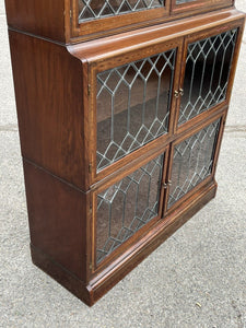 Edwardian Oak Sectional Bookcase With Lead light Glazing.