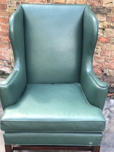 Green Leather Wingback Armchair.
