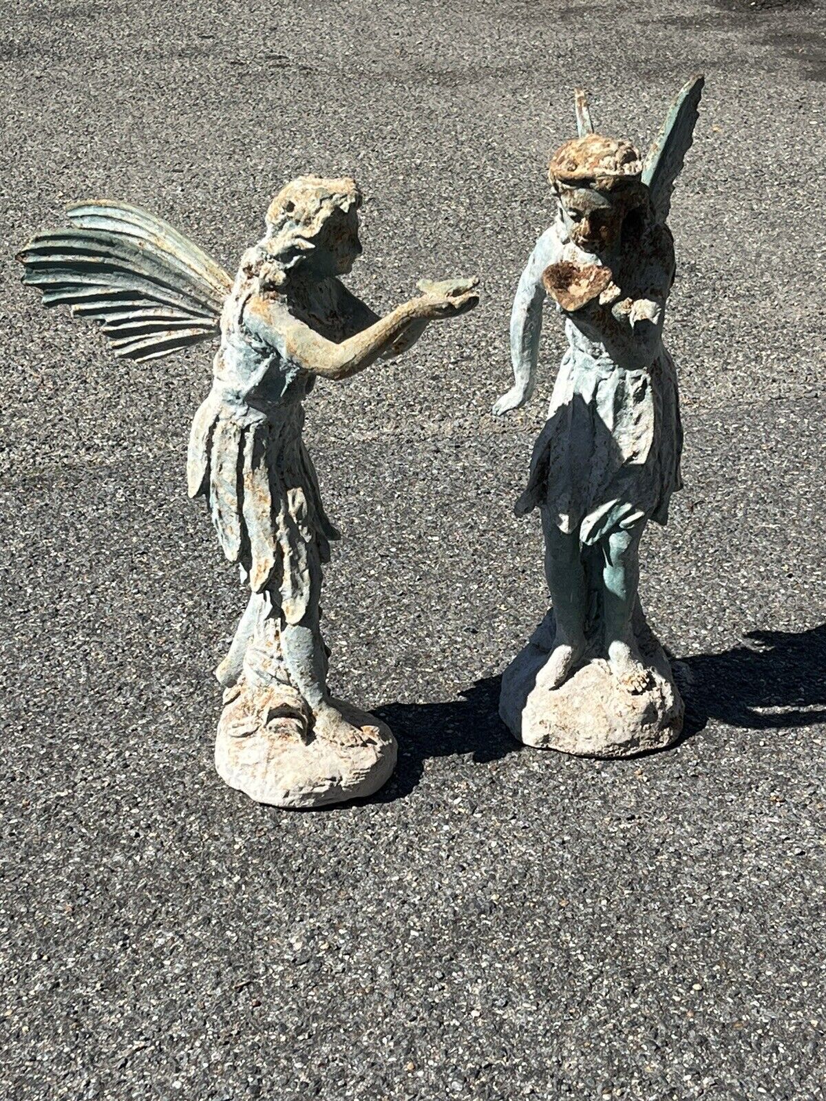Statues. Pair Of Faries Cast Iron, Large In Size. We ship worldwide.