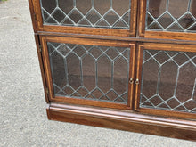 Edwardian Oak Sectional Bookcase With Lead light Glazing.