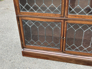 Edwardian Oak Sectional Bookcase With Lead light Glazing.