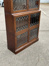 Edwardian Oak Sectional Bookcase With Lead light Glazing.