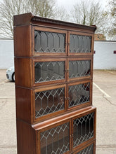 Edwardian Oak Sectional Bookcase With Lead light Glazing.