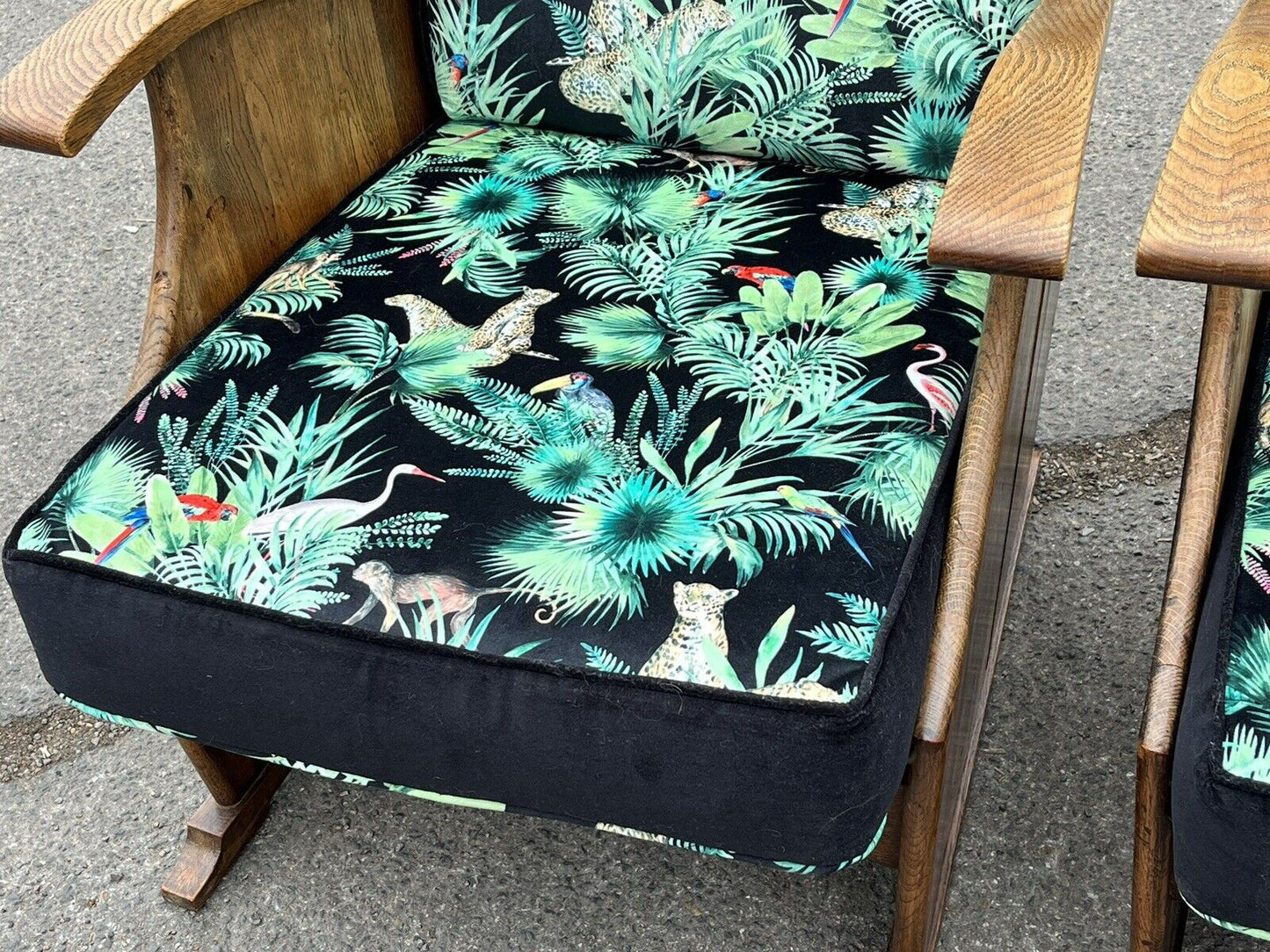 Mid Century Oak Armchairs Newly Upholstered In A Bright Jungle Print.