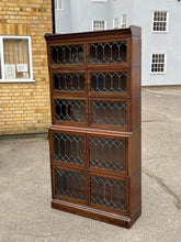 Edwardian Oak Sectional Bookcase With Lead light Glazing.
