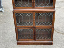 Edwardian Oak Sectional Bookcase With Lead light Glazing.