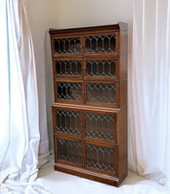 Edwardian Oak Sectional Bookcase With Lead light Glazing.
