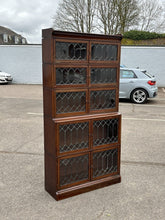 Edwardian Oak Sectional Bookcase With Lead light Glazing.