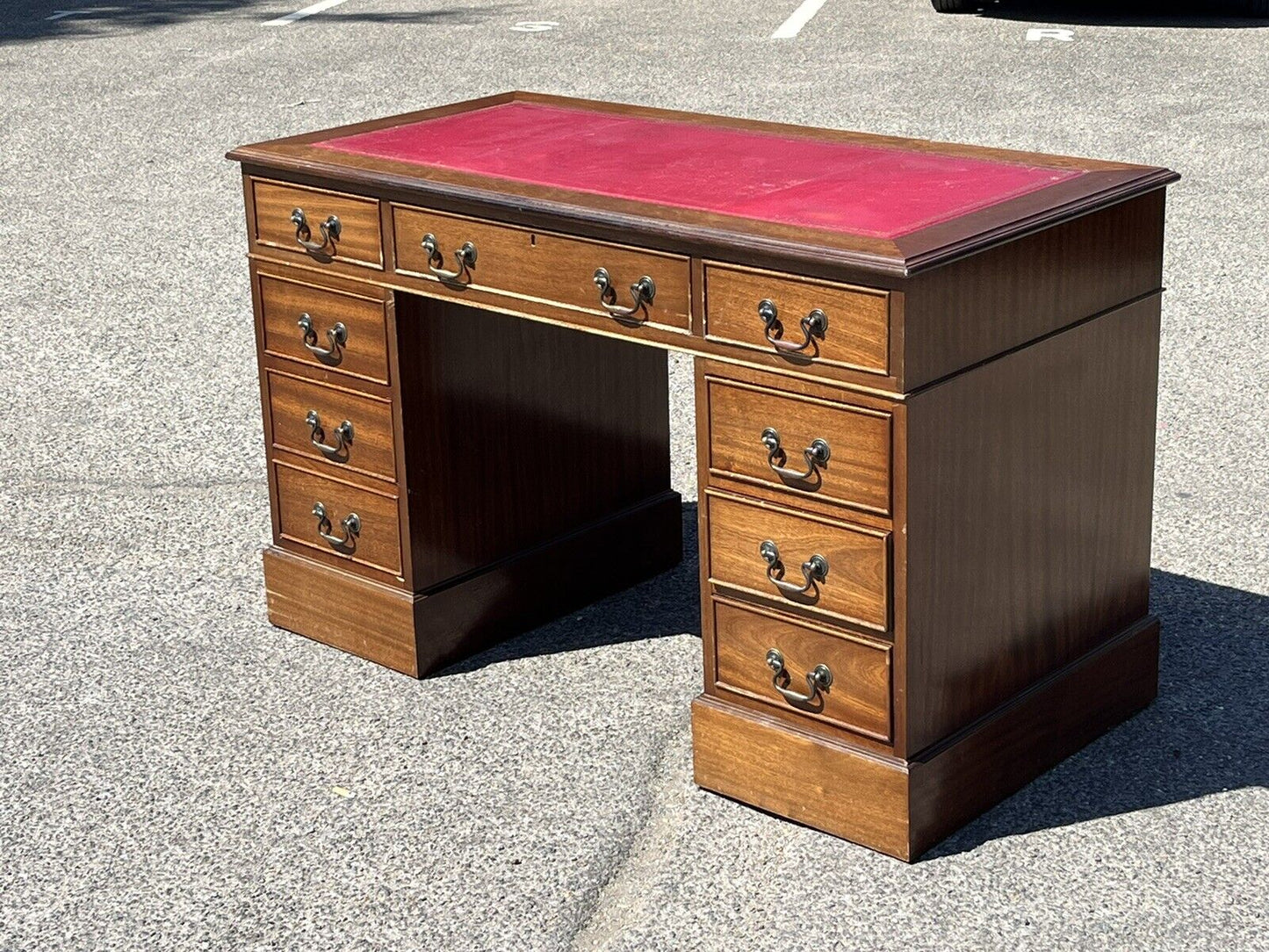 Pedestal Desk With Red Leather Top.