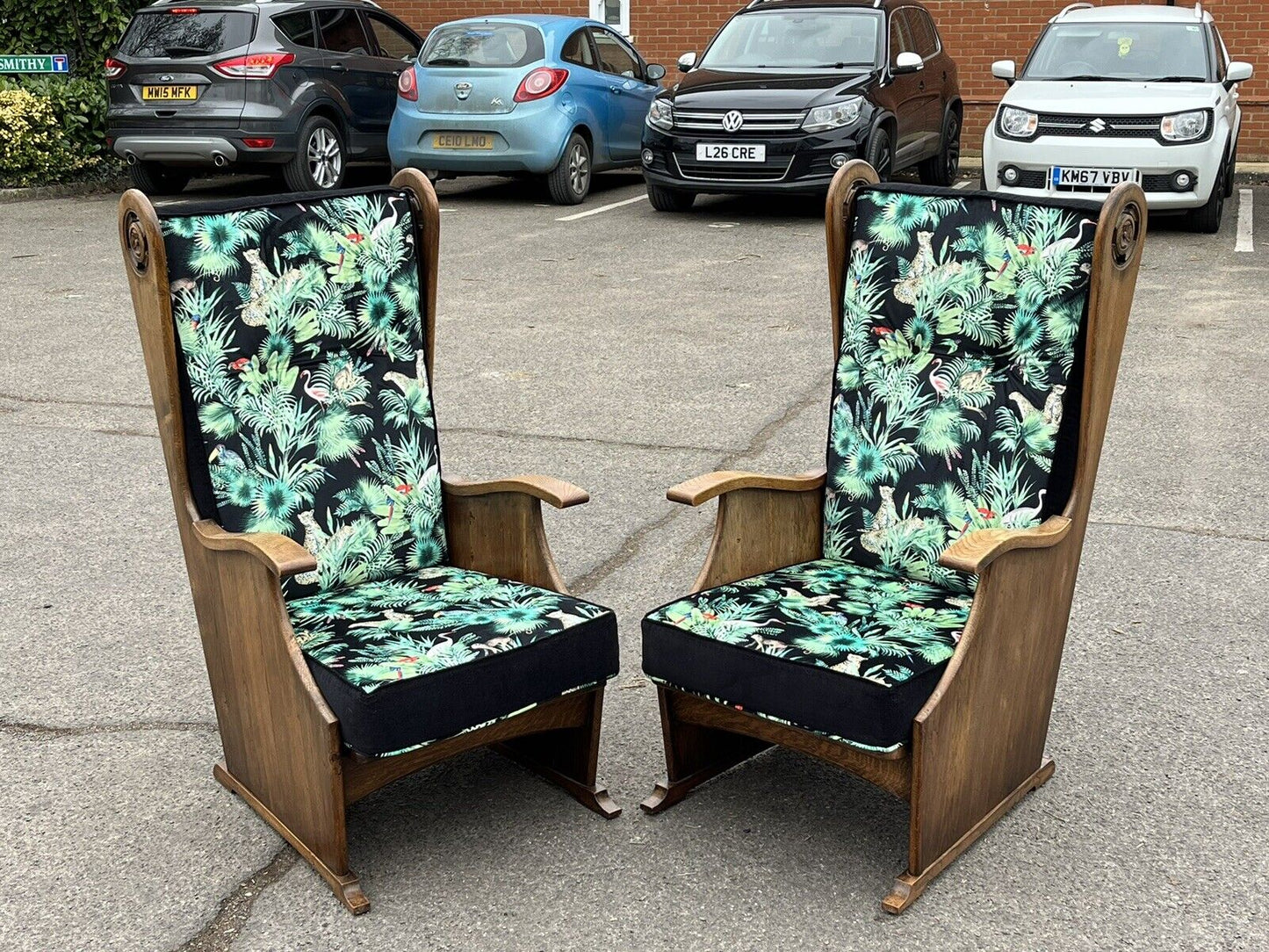 Mid Century Oak Armchairs Newly Upholstered In A Bright Jungle Print.