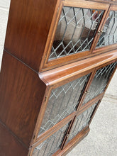 Edwardian Oak Sectional Bookcase With Lead light Glazing.