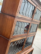 Edwardian Oak Sectional Bookcase With Lead light Glazing.