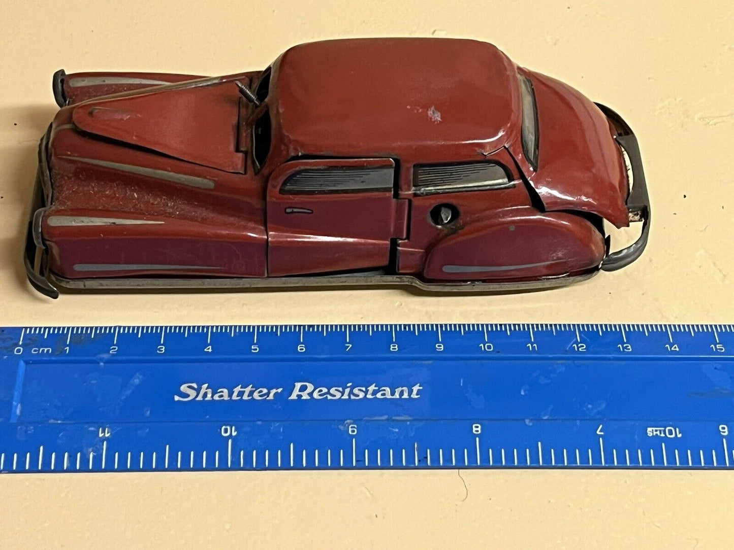 Old Metal Clockwork Toy Car.