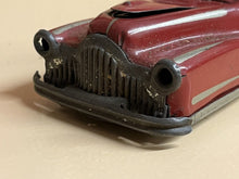 Old Metal Clockwork Toy Car.