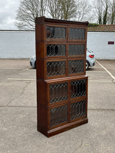 Edwardian Oak Sectional Bookcase With Lead light Glazing.