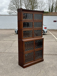 Edwardian Oak Sectional Bookcase With Lead light Glazing.
