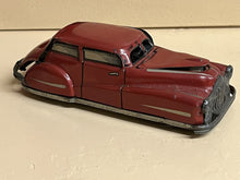 Old Metal Clockwork Toy Car.