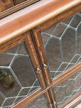 Edwardian Oak Sectional Bookcase With Lead light Glazing.