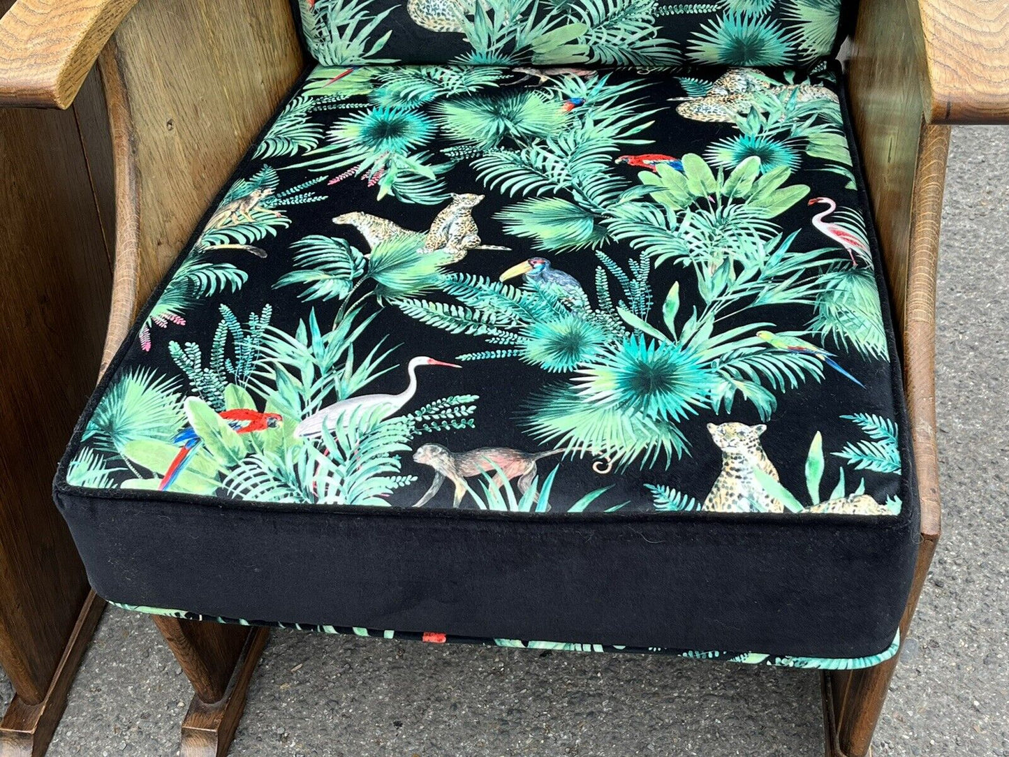 Mid Century Oak Armchairs Newly Upholstered In A Bright Jungle Print.