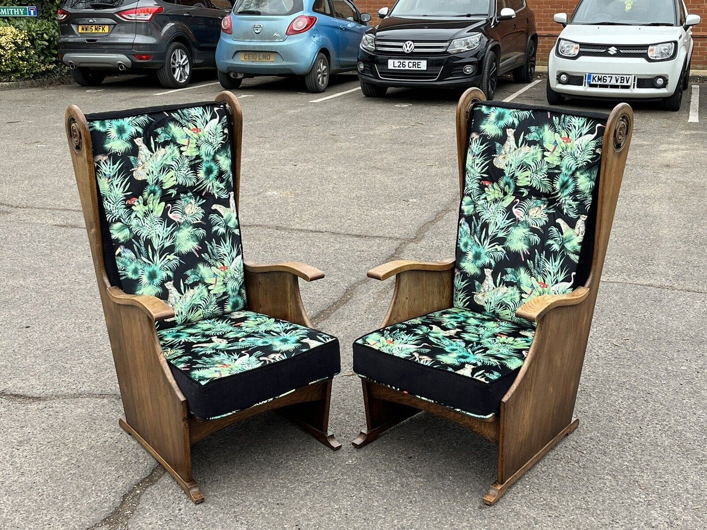 Mid Century Oak Armchairs Newly Upholstered In A Bright Jungle Print.