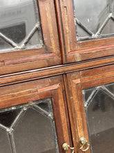 Edwardian Oak Sectional Bookcase With Lead light Glazing.