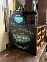 Advertising Cabinet. Remington Shop Counter Cabinet.